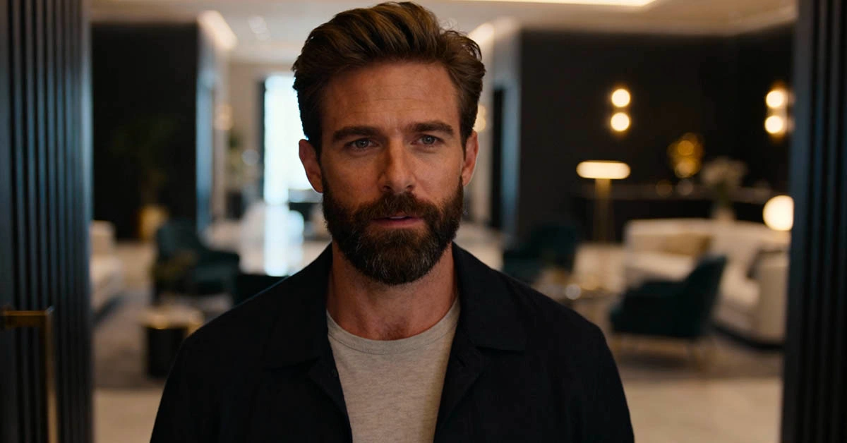 Confident man entering a room, well-groomed and stylish