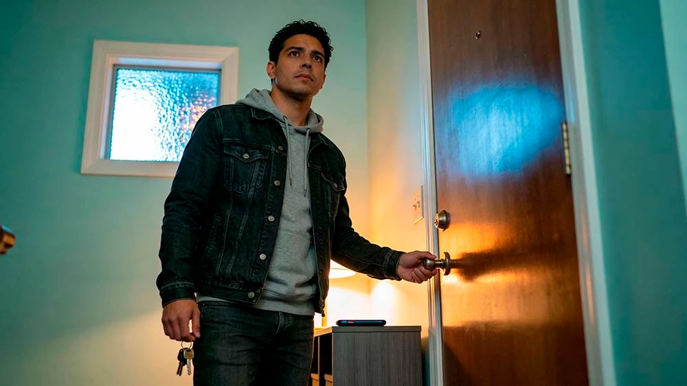 Choosing a night without texting your ex in January how to stop texting your ex in january — same man leaving his apartment with keys in hand and phone left face down on the console table