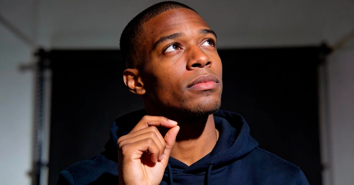 awkward silence on video call moment man thinking what to say next neon home office